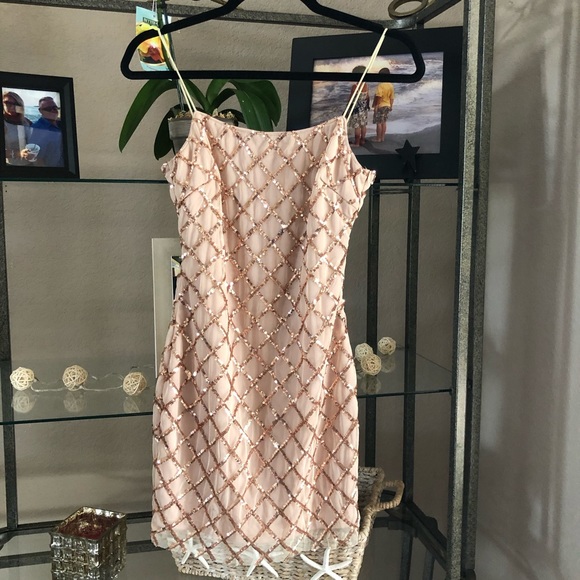 rhythm of love dress in rose gold